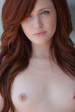 gorgeous eyes. oh and some nice tits; Big Tits Red Head 